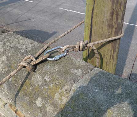Securely fixing a rope on the opposite side of the Church